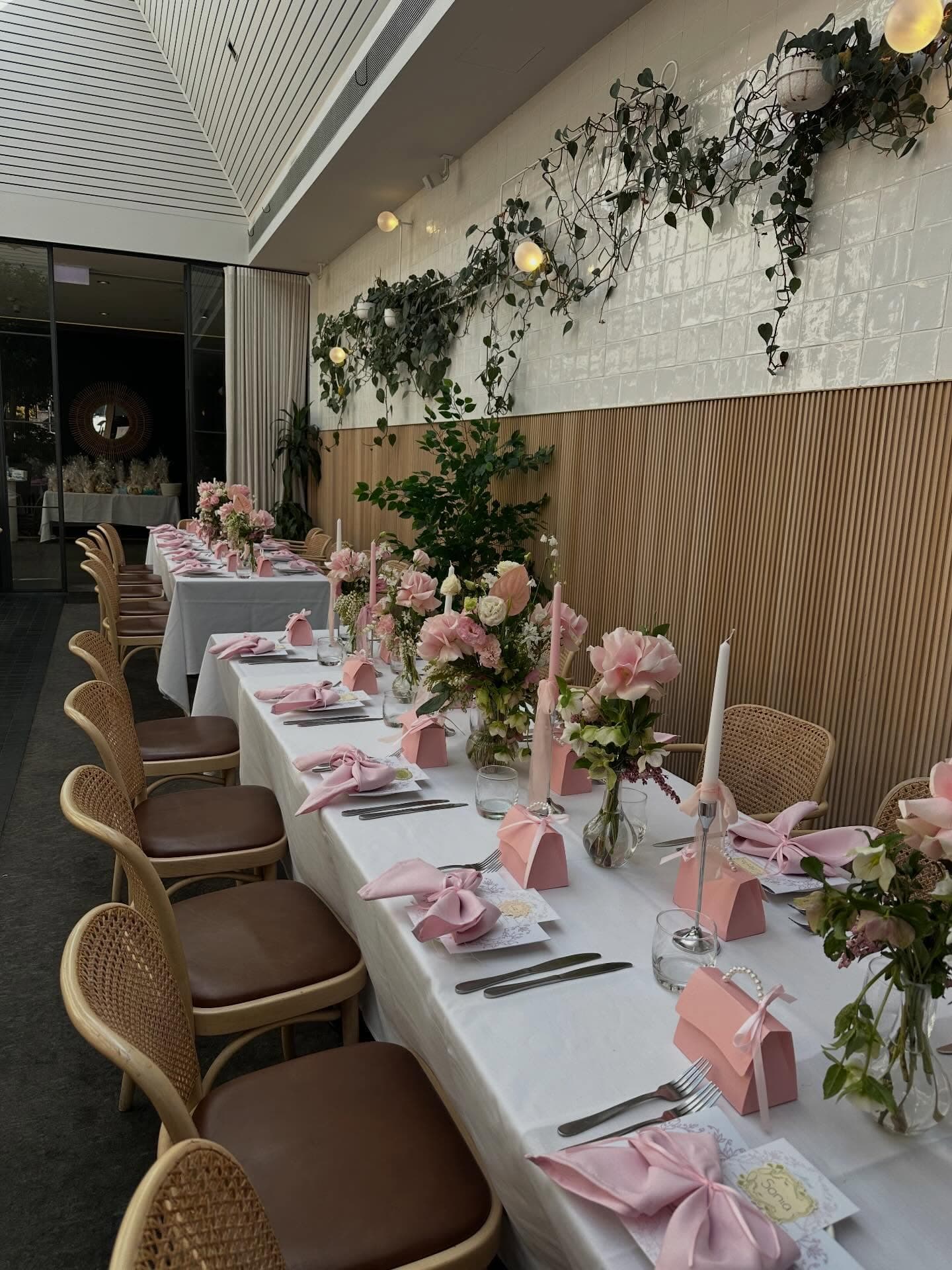 Pink florals and styled table linen for a baby shower at The Feathers