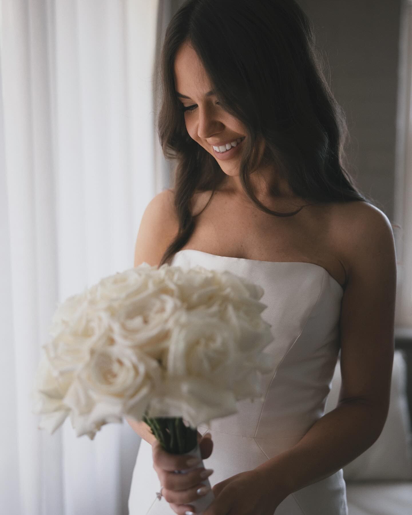 Detail of reflexed white rose bouquet, soft natural light